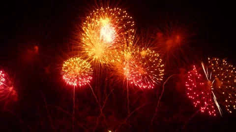 Vibrant fireworks display lighting up the night sky during a celebration Stock Footage 337463952