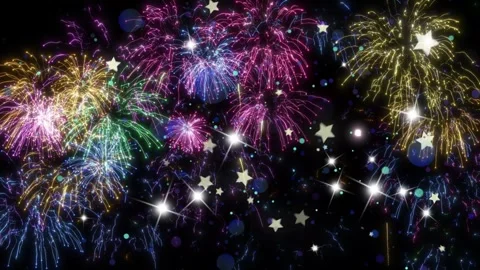Vibrant fireworks explode in colorful night sky with sparkling stars Video stock 337446444