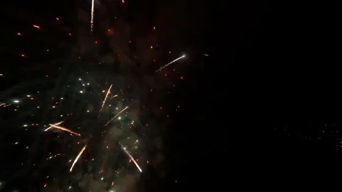 Vibrant fireworks exploding in the night sky, aerial view Stock Footage 281926039
