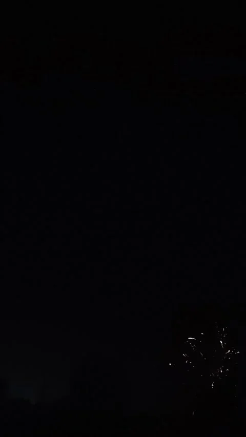 Vibrant Fireworks Exploding in Night Sky during Christmas Lights Switch-On .. Stock Footage 321655733