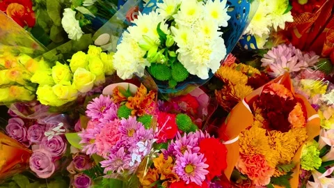 Vibrant floral bouquets create a dynamic and colorful display, perfect for 動画素材 318310951