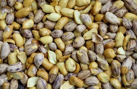 Vibrant Food Texture Background Pattern of Shelled Tiger Stripe Peanuts Stock Photos