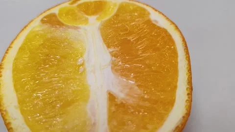 Vibrant Fresh Orange Slice in 4K Stock Footage 319441354