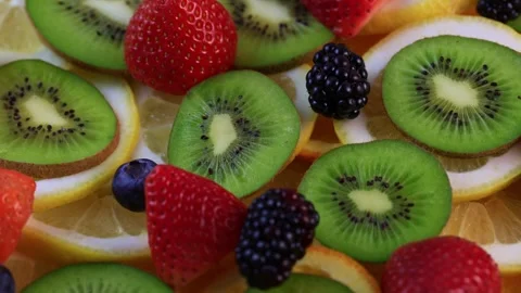 Vibrant Fruit Collage rotation  4k Stock Footage 327661872