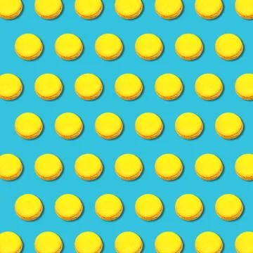 Vibrant geometric pattern of yellow macaroons on turquoise background Stock Illustration
