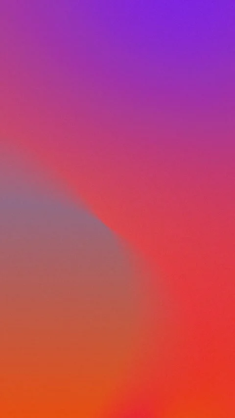 Vibrant gradient of purple, pink, and orange hues creating a smooth, seamless 動画素材 309956963