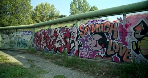 Vibrant Graffiti Marks Pedestrian Overpass Bridge Adjacent Busy Highway Stock Footage 202999585