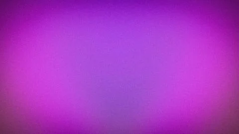 Vibrant grainy gradient background with bright purple and neon violet light.. Stock Photos