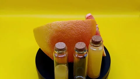 Vibrant grapefruit and fresh-squeezed juice Stock Footage 331032581