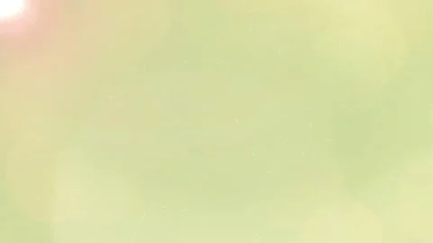 Vibrant green abstract bokeh background texture featuring vintage film scratch 스톡 동영상 345216636