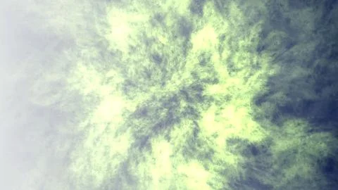 Vibrant green and blue cloudy sky with bright sunlight 스톡 일러스트