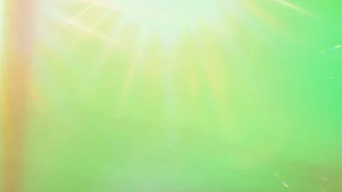 Vibrant green and orange light streaks shine brightly Stock Footage 338217224