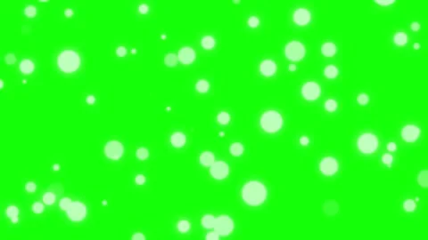 Vibrant green glitter explosion on dark background. High-speed particle burst Stock Footage 340943265