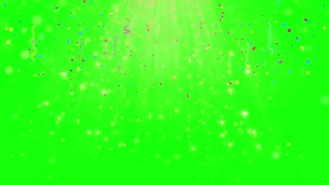 Vibrant green glitter particles exploding with golden sparkles on dark Video stock 343807958