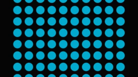 A vibrant grid of bright blue circles arranged neatly on a dark black backg.. Stock Footage 339617363