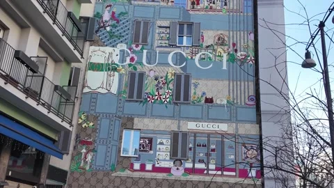 Vibrant Gucci Mural on Corso Garibaldi in Milan Showcasing Urban Creativity Stock Footage 328085935