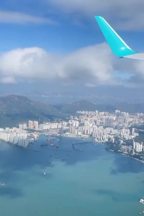Vibrant Harbor City Basks Beneath Morning Sky Stock Footage 321181004