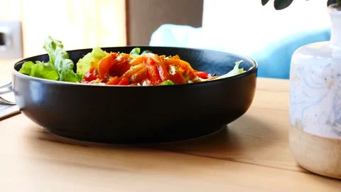 A vibrant Healthy Vegetable Salad displayed beautifully in a Black Bowl filled Stock Footage 311874096