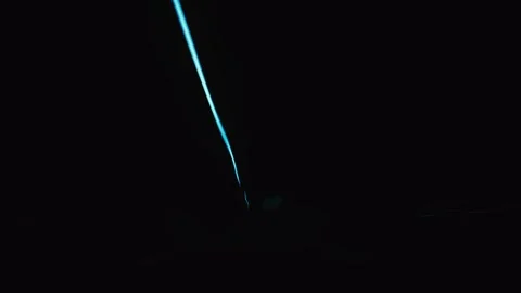 Vibrant hyperlapse showing streaks of blue light trails in the dark. Stock Footage 327415887