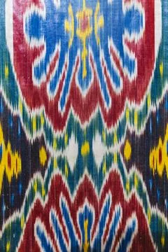 Vibrant ikat textile featuring bold geometric motifs Stock Photos