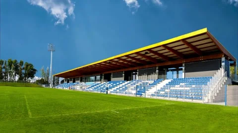A vibrant image of an empty soccer stadium on a clear, sunny day. Stock Footage 307293769