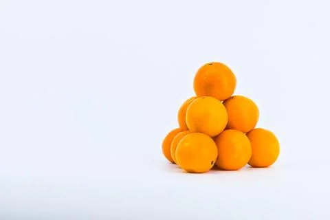 A vibrant image showcasing mandarins on a white background. Stock Photos