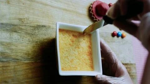Vibrant ingredient study of close view of smooth baked custard texture Foto stock