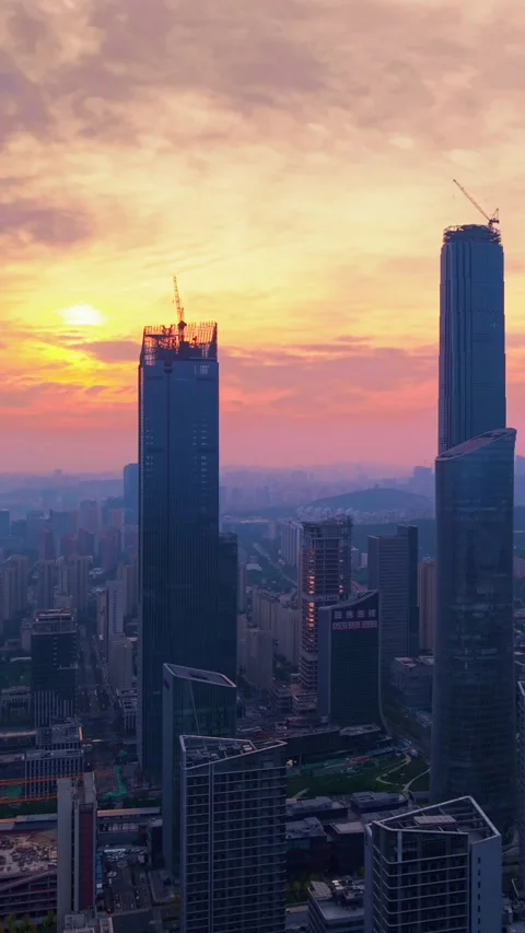 Vibrant Jinan CBD Sunset: Modern Cityscape with Soaring Skyscrapers Stock Footage 331228658