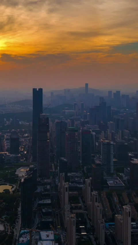 Vibrant Jinan CBD Sunset: Modern Cityscape Aerial View Stock Footage 331228736