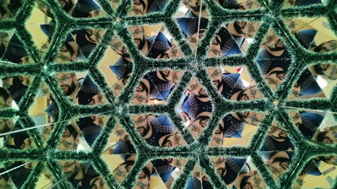 Vibrant Kaleidoscope Patterns of Indian Man at Museum of Illusions in Dubai Stock Footage 333980297