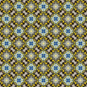 A vibrant kaleidoscopic seamless pattern with geometric floral motifs in Stock Illustration