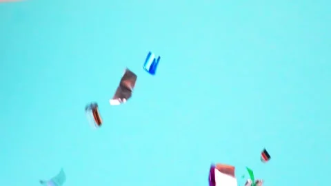 Vibrant kite soars against a clear blue sky during a sunny afternoon Video stock 295190509