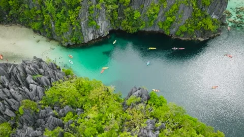 Vibrant Lagoons surrounded by limestone towering hills. El Nido, Philippines. Stock Footage 309753831