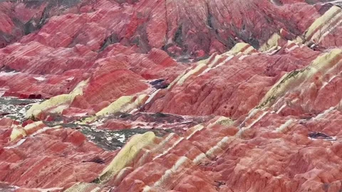 Vibrant Layers of Red and Yellow Danxia Landform Rouge Mountain China Stock Footage 339585168