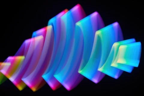 Vibrant Light Abstract. A dynamic abstract composition with flowing neon colors Stock Photos