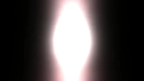 Vibrant light burst emanates from darkness, creating a powerful, energetic Stock Footage 314889958