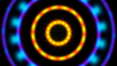 Vibrant light circles create dynamic visual motion in dark Stock Footage 338009965