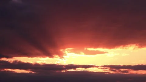 Vibrant light rays spreading across a fantastic sunrise sky Stock Footage 337451658