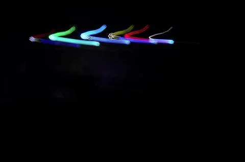 Vibrant light trails in the darkness Stock Photos