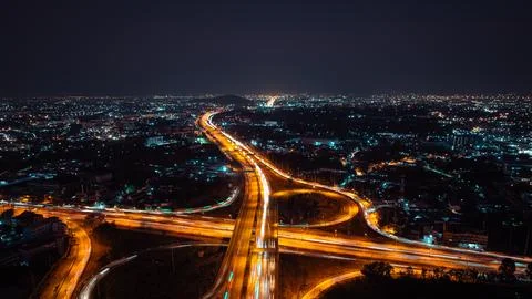 Vibrant Light Trails On Expressway Interchange At Night In Chonburi Thailan.. Stock Photos