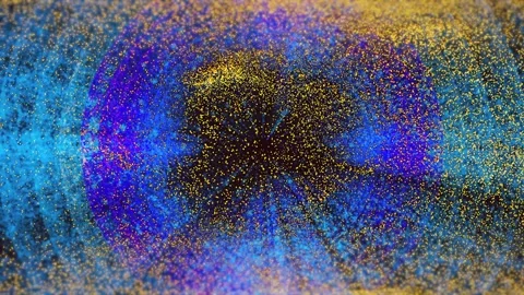 Vibrant lights and glittering particles fill the air at a nighttime Video stock 304609549