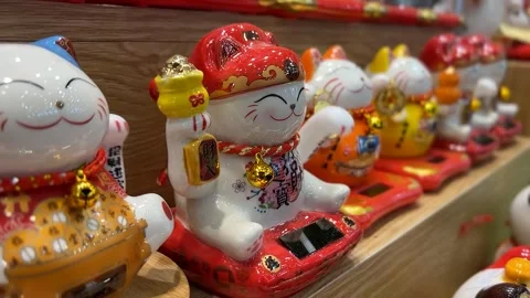 Vibrant Maneki neko Figurines for Prosperity Stock Footage 287954554