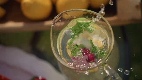 Vibrant market setting featuring citrus and floral ice cubes. Scene showcasing Stock Footage 329895587