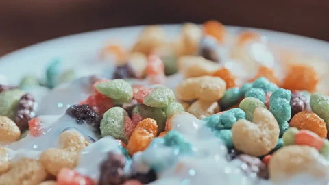 Vibrant Multi-Colored Cereal with milk Video stock 344687357