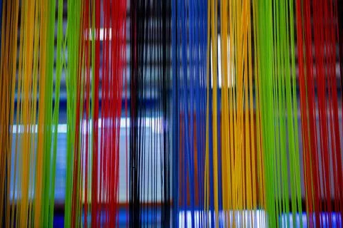 Vibrant Multicolor Vertical Threads Abstract Background Pattern Foto stock