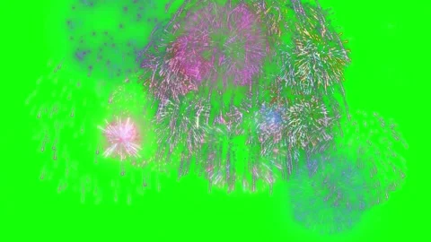 Vibrant multicolored fireworks display exploding against a solid green 스톡 동영상 338314566