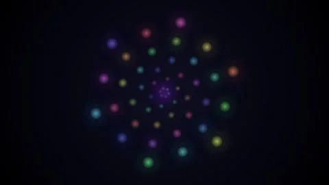 Vibrant multicolored light dots arranged in a symmetrical spiral pattern 库存影片 335118060