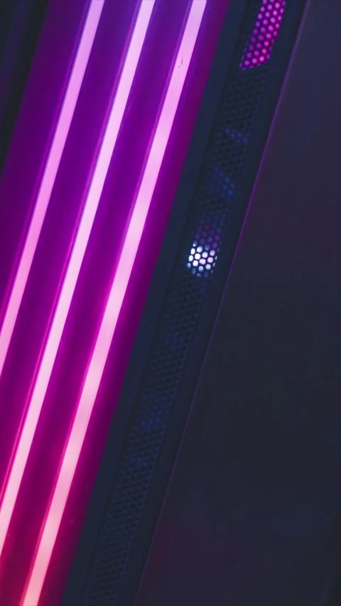 Vibrant neon light strips transitioning through pink red yellow green and blue Stock Footage 345976578