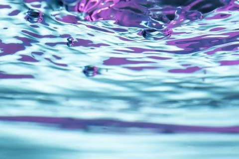 Vibrant neon liquid textured background Stock Photos