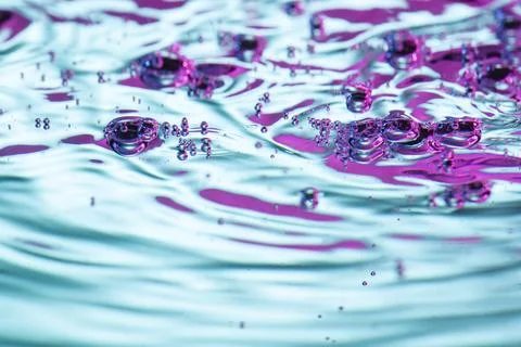Vibrant neon liquid textured background Stock Photos